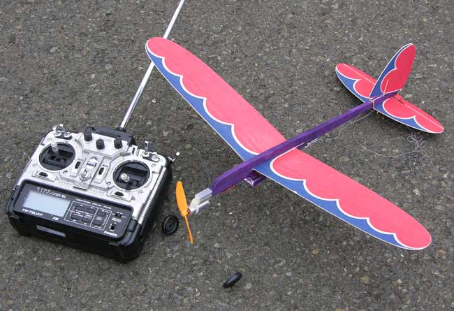 The radio transmitter and the RC Jim Walker Pursuit are ready to fly